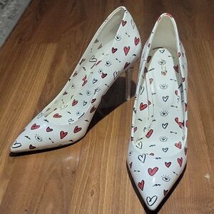Aldo White Heels with Red Heart and Eye Design.